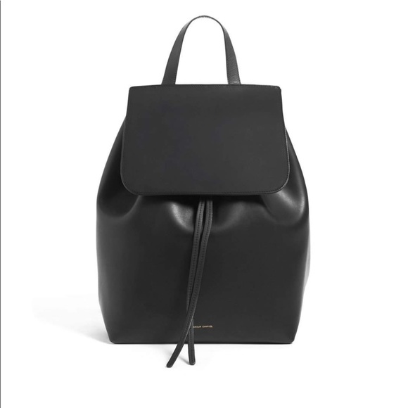 Mansur Gavriel Handbags - Black leather backpack, with red interior.